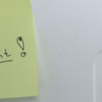 Sticky note reminder about rent payments