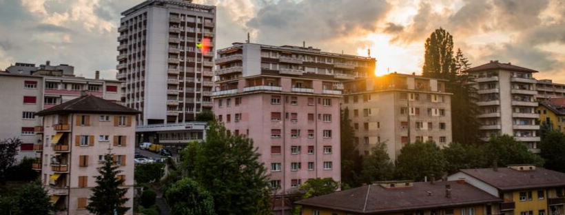 Millenial Renters apartment buildings against setting sun