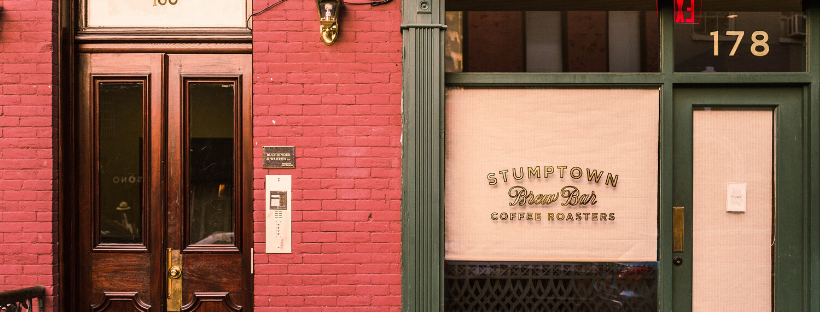 Storefronts of two main street businesses